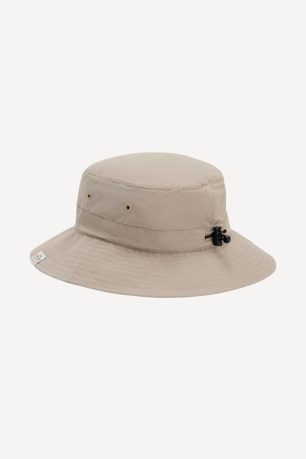 Chapeau anti-UV beige UPF 50+ pour femme, idéal pour une protection solaire lors de journées ensoleillées.