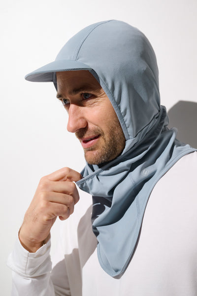 Cagoule visière anti-UV - Ventoux, homme portant un modèle léger en bleu, idéal pour la protection solaire UPF 50+.