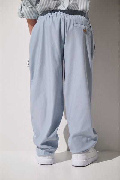 Pantalon anti-UV - Faro bleu clair pour enfant, léger et confortable, offrant une protection solaire UPF 50+.