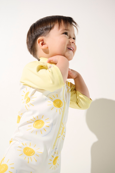 Combinaison de bain anti-UV - Pacific pour enfant, manches longues, motif soleil, protection solaire UPF 50+.