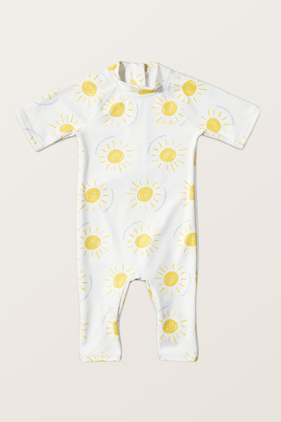 Combinaison de bain anti-UV - Pacific pour bébé, à manches courtes, UPF 50+, décorée de motifs soleils.