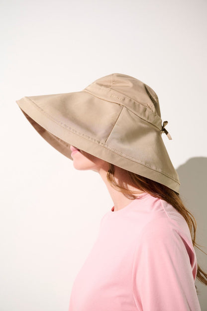 Chapeau anti-UV - Faro beige pour femme, large bord UPF 50+ idéal pour jardiner et activités extérieures.