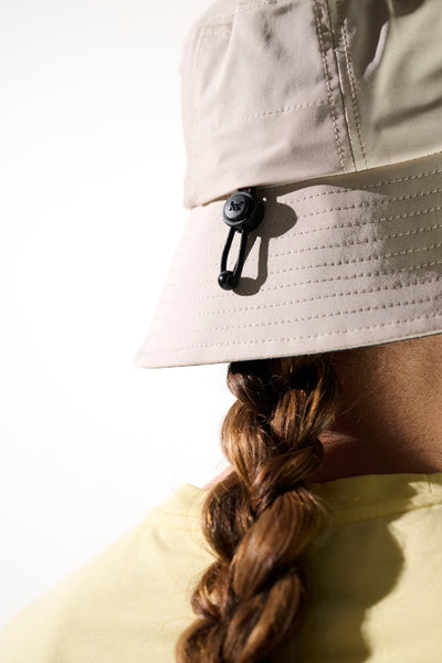 Bob anti-UV - Faro beige pour femme, léger avec protection solaire UPF 50+, idéal pour les activités en extérieur.