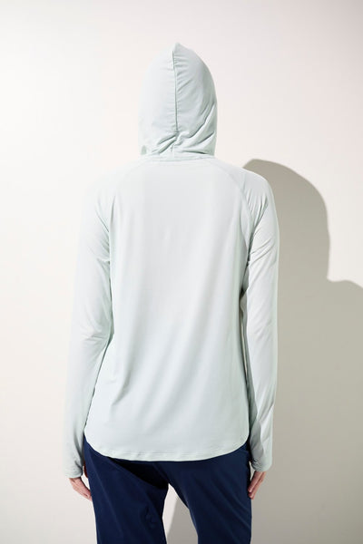 T-shirt anti-UV à capuche léger pour femme, couleur vert d'eau, idéal pour le sport avec protection UPF 50+.