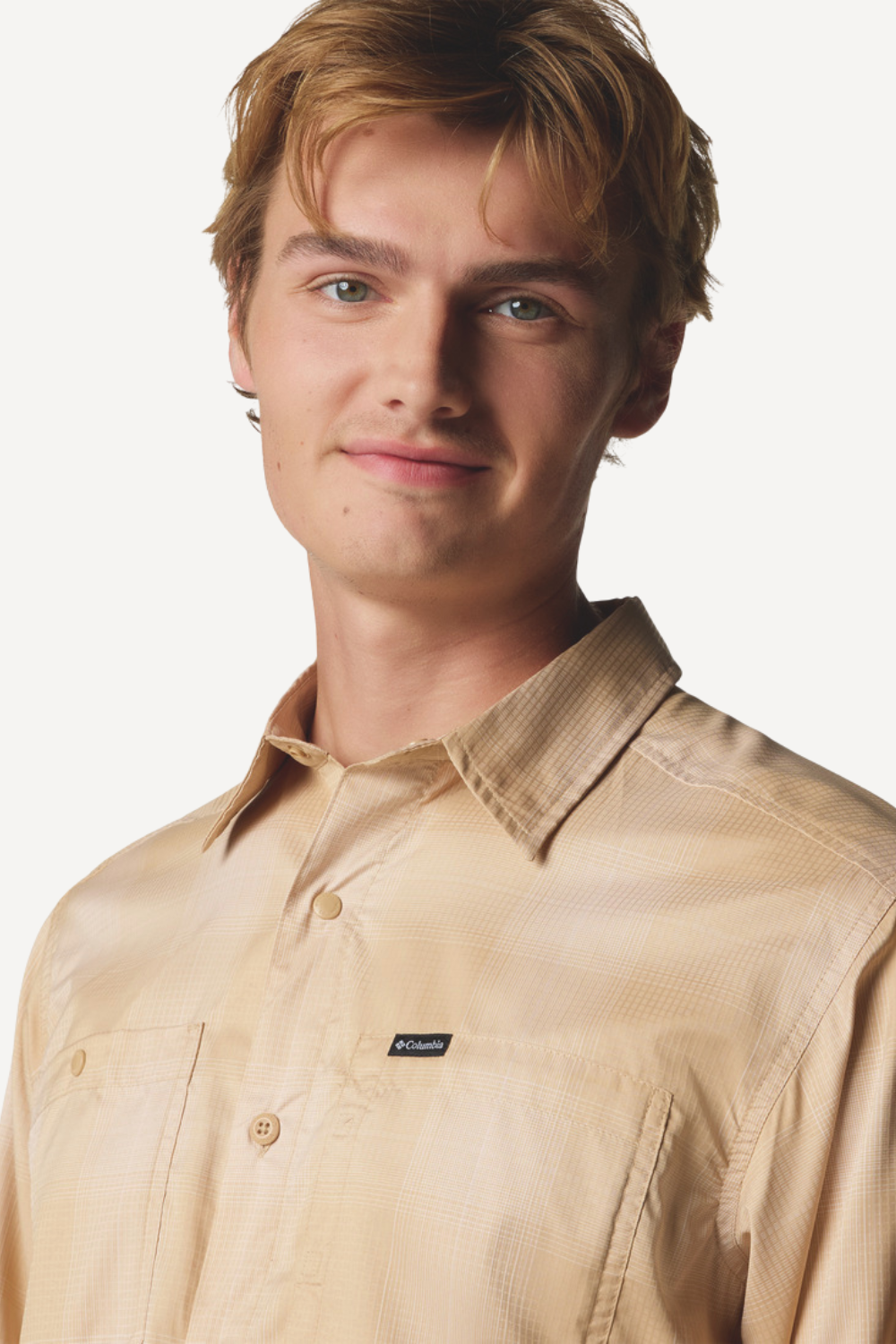 Chemise anti-UV beige Columbia, manches longues, certifiée UPF50+, parfaite pour une protection solaire élégante.